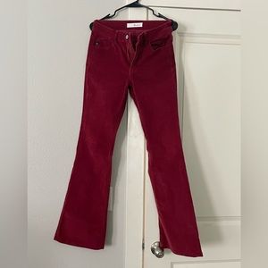 Burgundy corduroy Kancan flare pants.